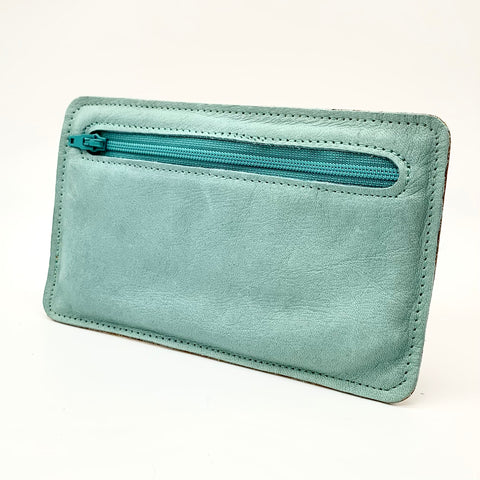 Baby blue and embossed beige purse